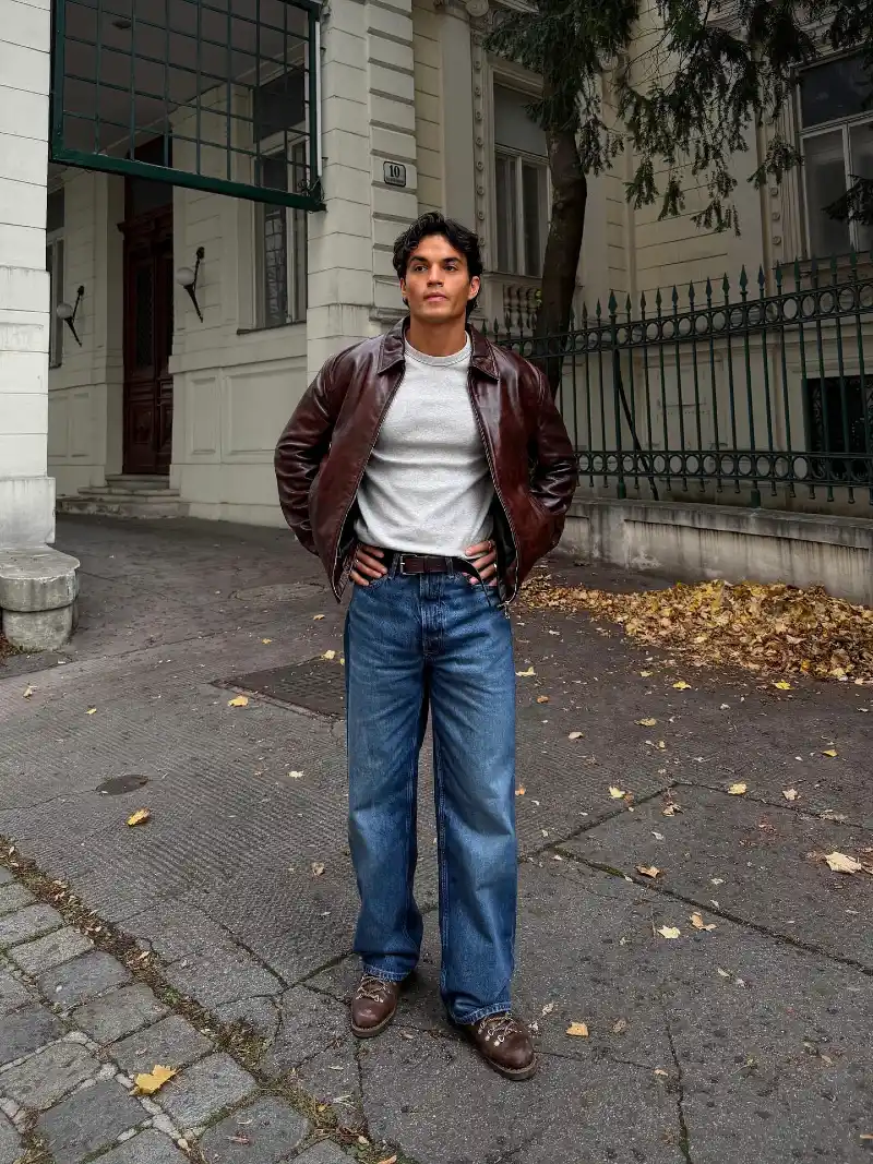 Distressed Brown Leather Bomber with Loose Denim and Hiking Boots
