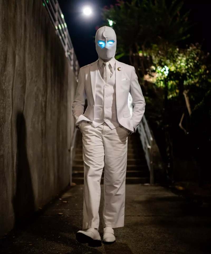 All-White Three-Piece Suit with Glowing Mask and Crescent Pin