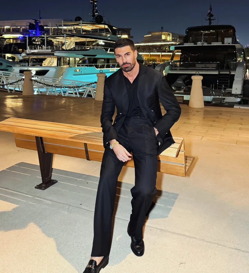 Black Double-Breasted Suit with Dark V-Neck and Horsebit Loafers