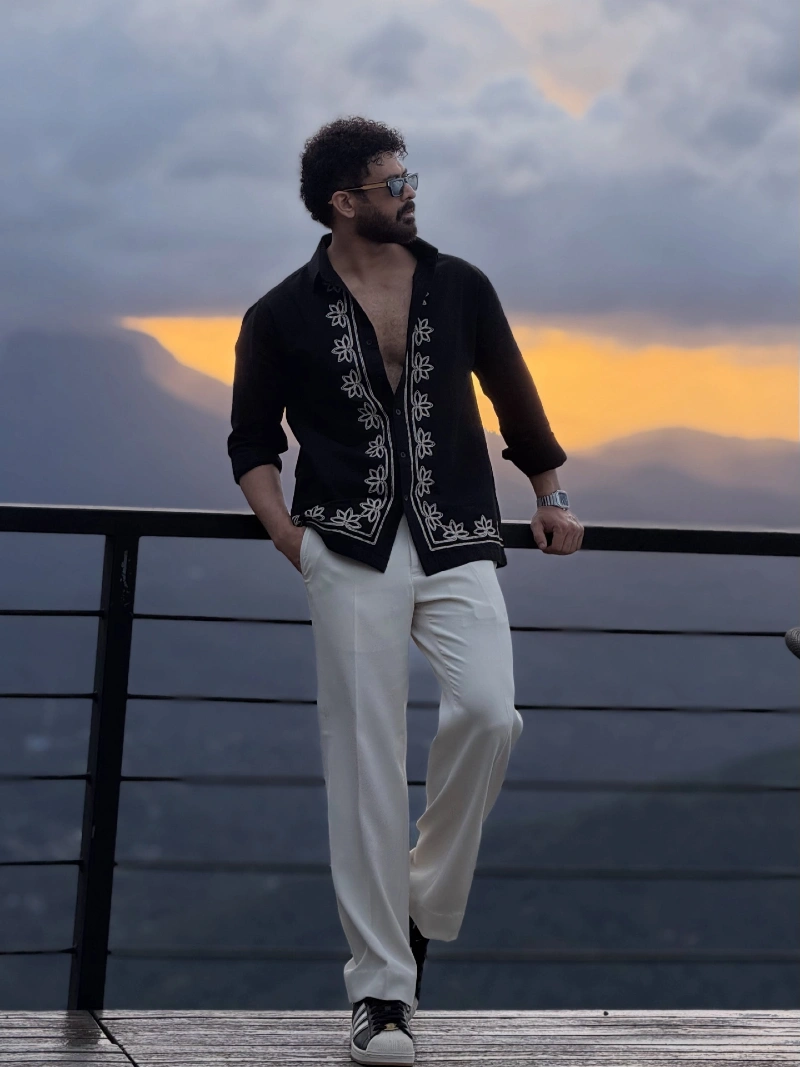 Black Embroidered Shirt with Cream Trousers and Retro Sneakers