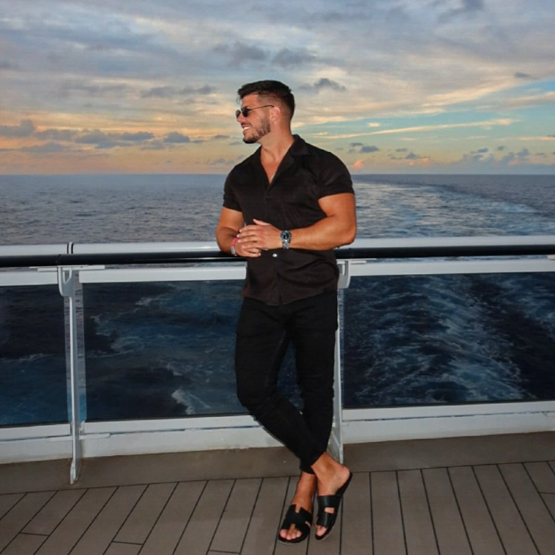 Black Short-Sleeve Shirt with Slim Dark Denim and Leather Slides