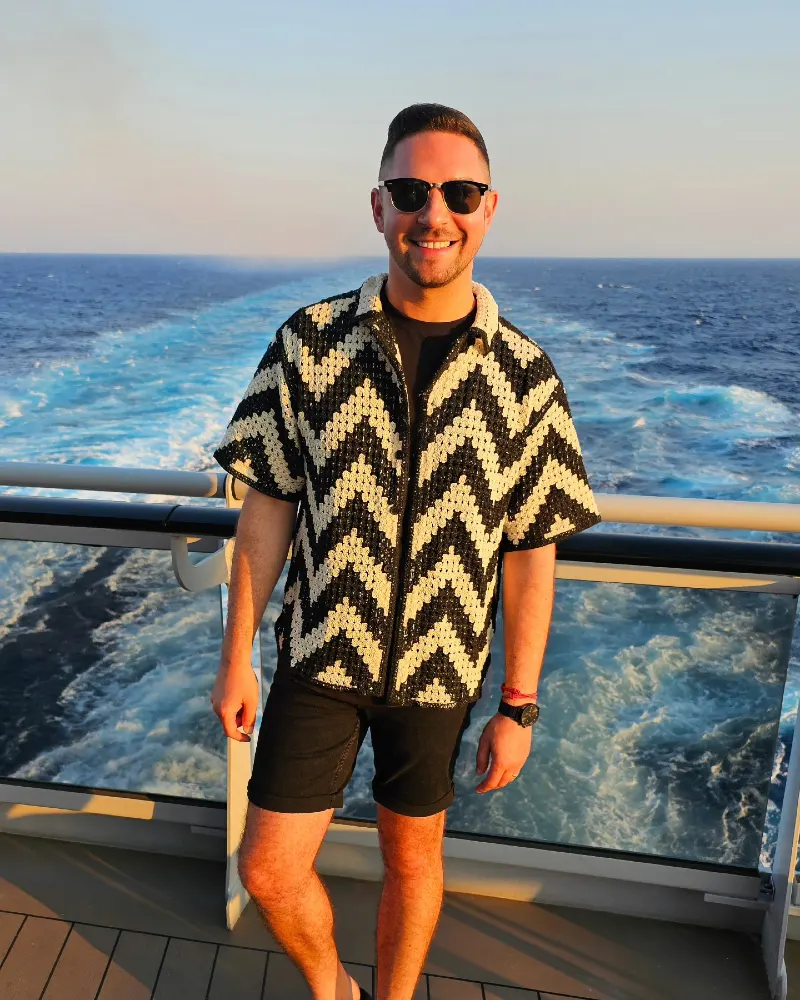 Black and White Crochet Chevron Shirt with Dark Shorts