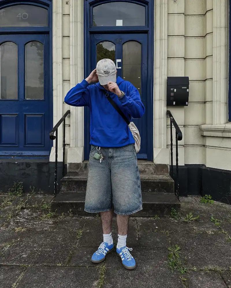 Bright Blue Hoodie with Long Faded Denim Shorts