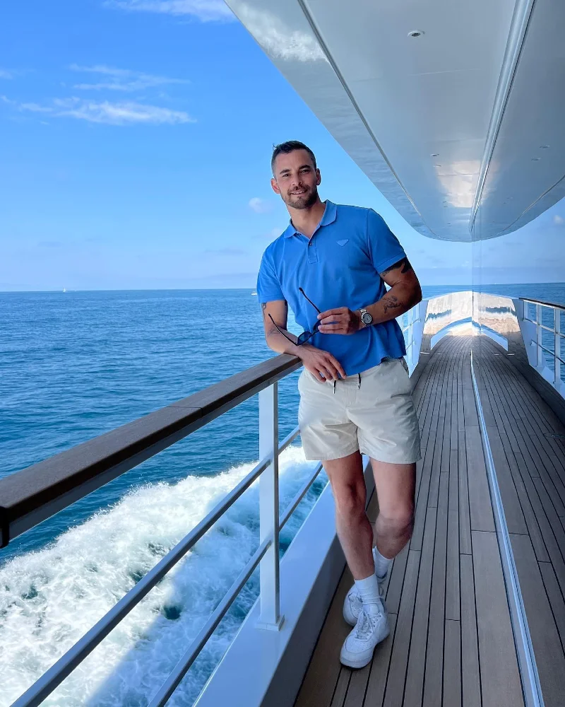 Bright Blue Polo with Cream Drawstring Shorts and Chunky Sneakers