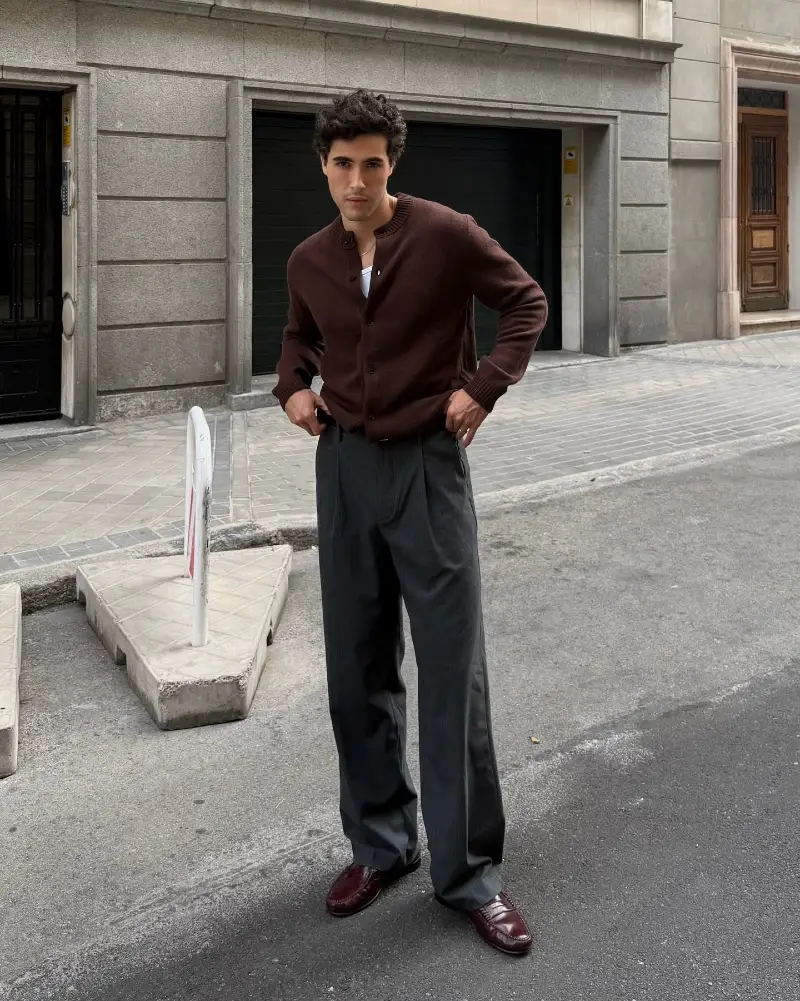 Brown Knit Cardigan with Pleated Charcoal Trousers and Burgundy Loafers