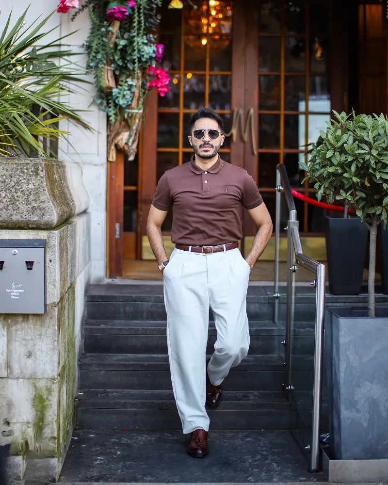 Brown Polo Shirt with White Pleated Trousers and Tassel Loafers