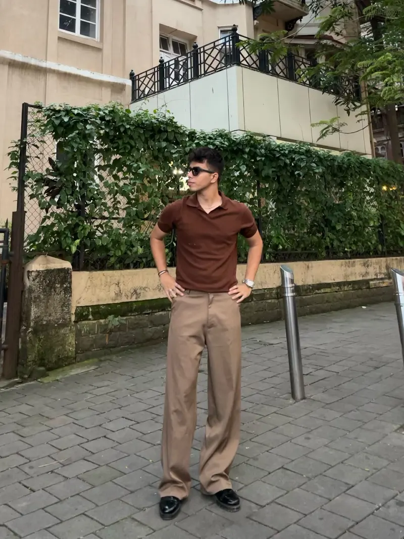 Brown Short-Sleeve Polo with Wide Khaki Trousers and Black Loafers