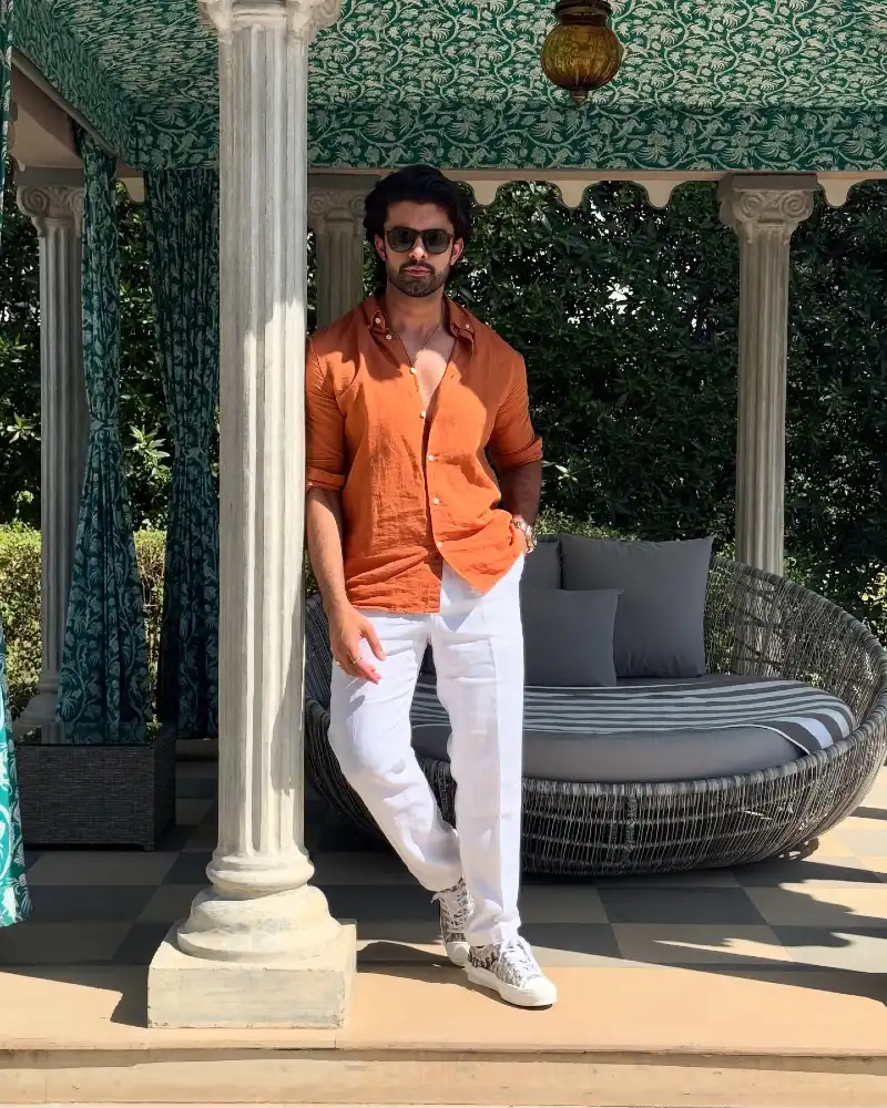 Burnt Orange Linen Shirt with White Trousers and Patterned Sneakers
