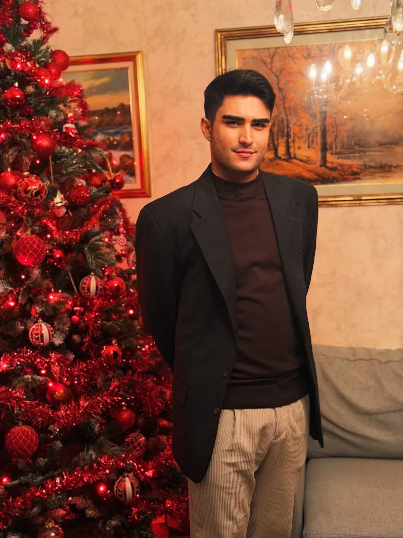 Charcoal Blazer over Chocolate Mock Neck with Pleated Oat Trousers