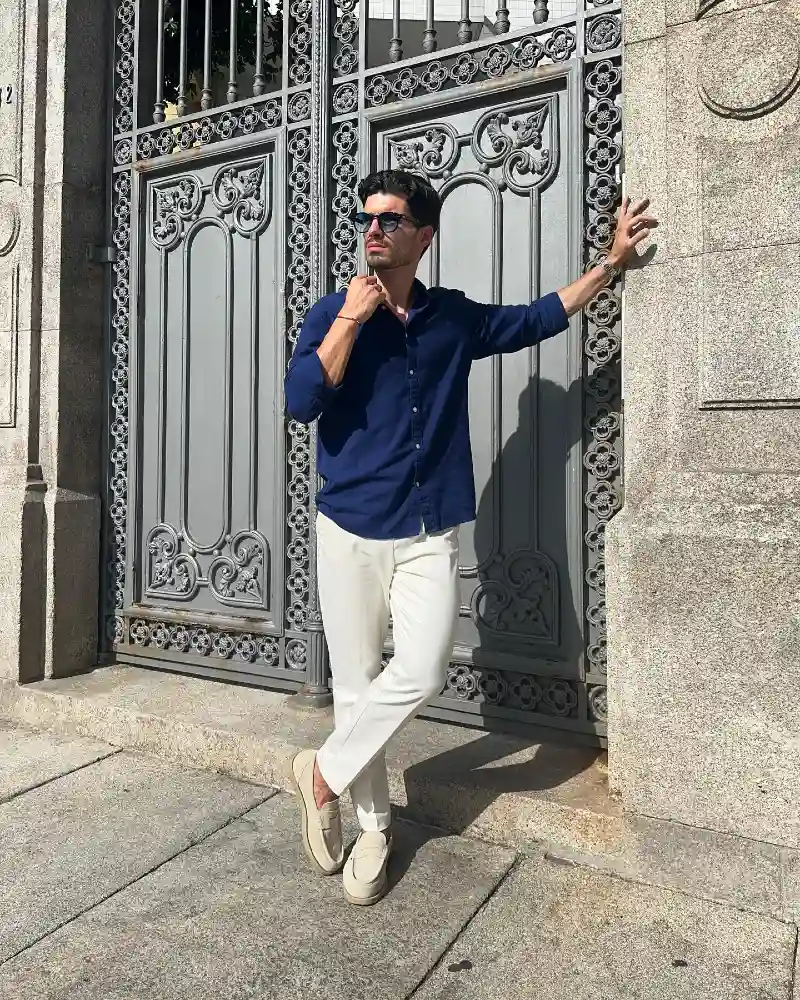Deep Navy Button-Down with White Trousers and Beige Loafers