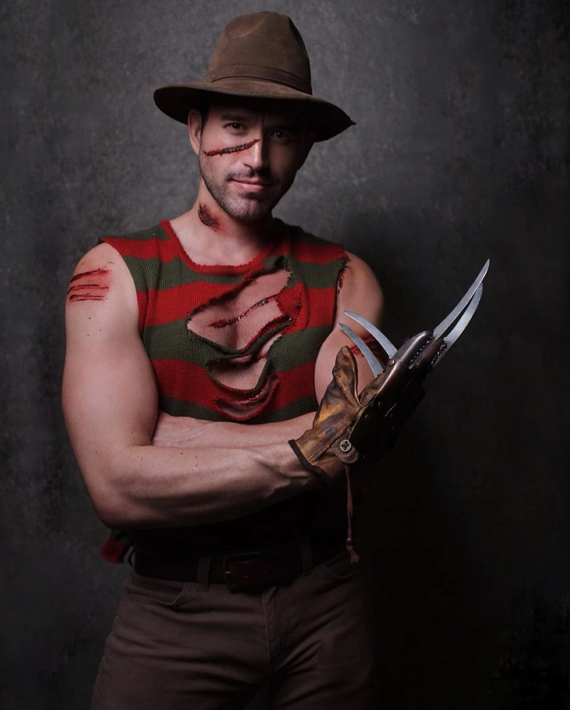 Distressed Striped Knit Tank with Brown Fedora and Bladed Glove