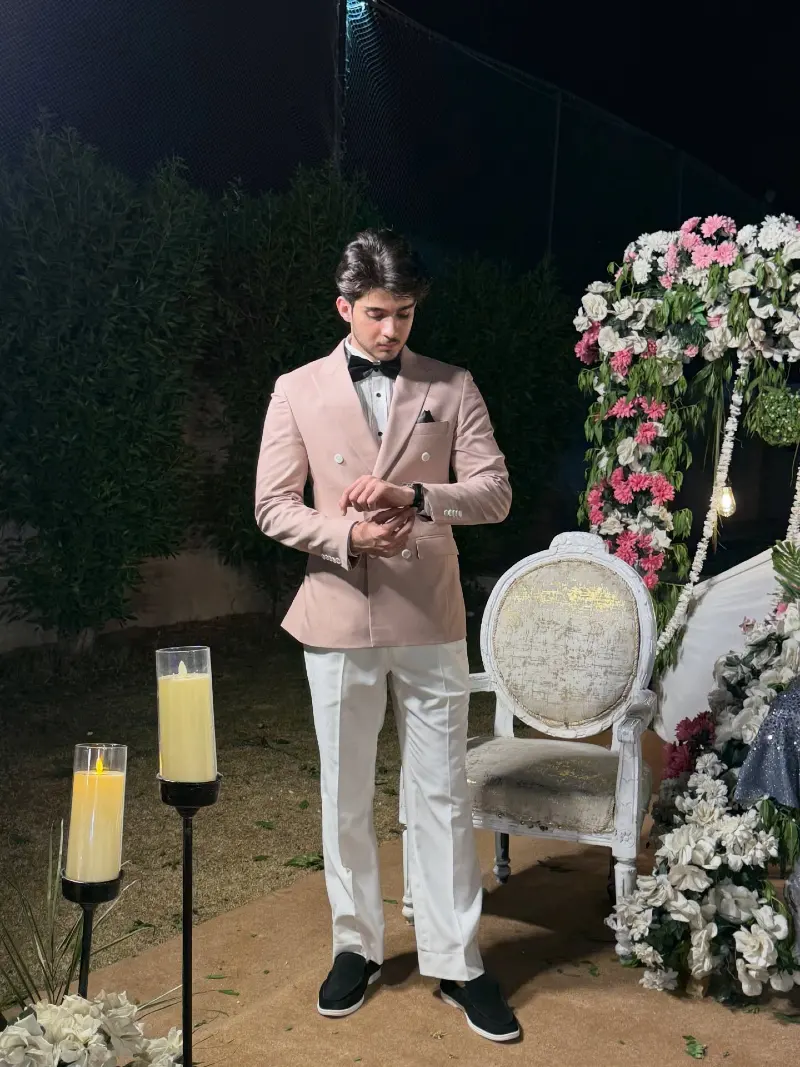 Dusty Pink Double-Breasted Jacket with White Trousers and Black Bow Tie