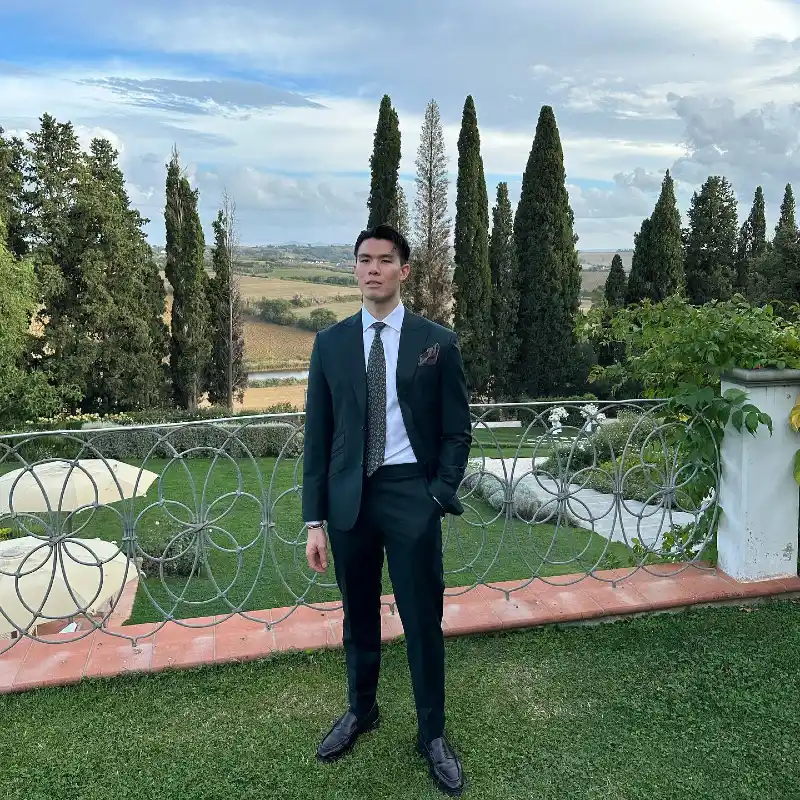 Forest Green Suit with Patterned Tie and Leather Loafers