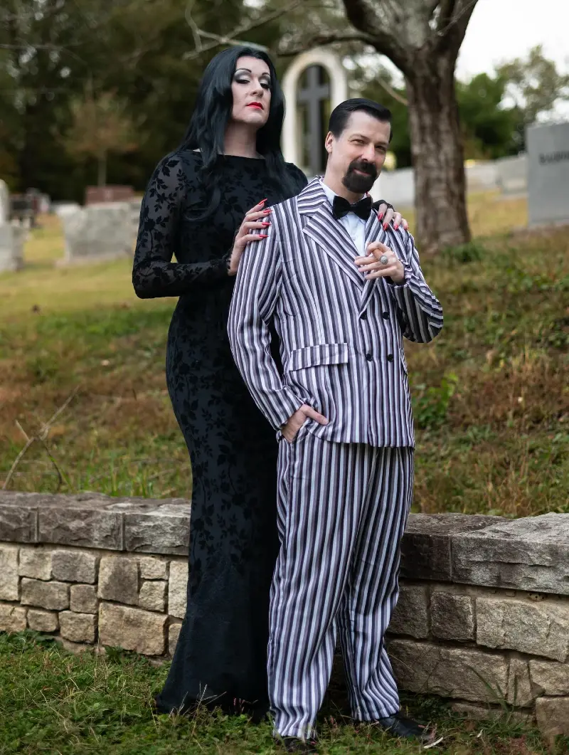 Gomez and Morticia Addams with Bold Striped Double-Breasted Suit and Patterned Maxi Dress