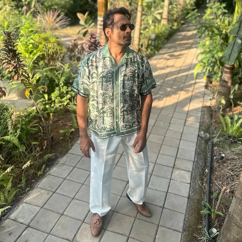 Green Silk Scarf-Print Shirt with Crisp White Trousers