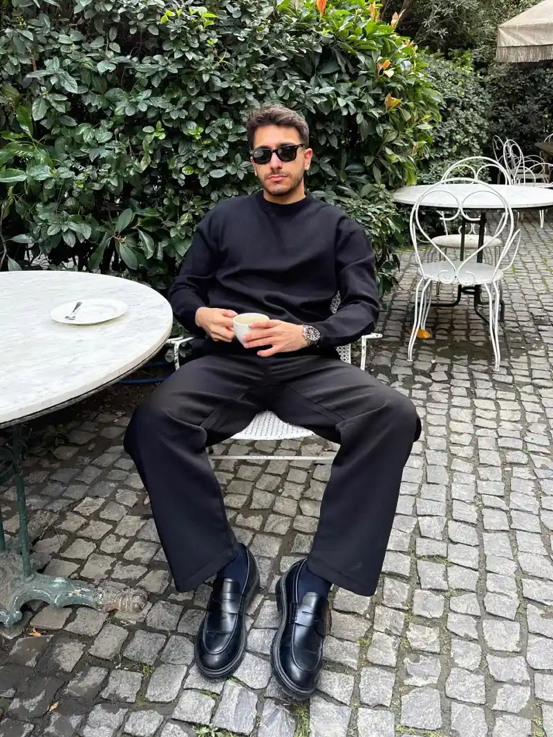 Heavy Black Crewneck with Relaxed Trousers and Chunky Loafers