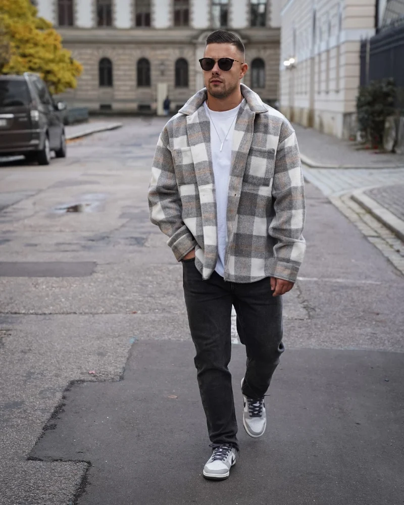 Heavy Grey Plaid Overshirt with Dark Washed Jeans and Two-Tone Sneakers