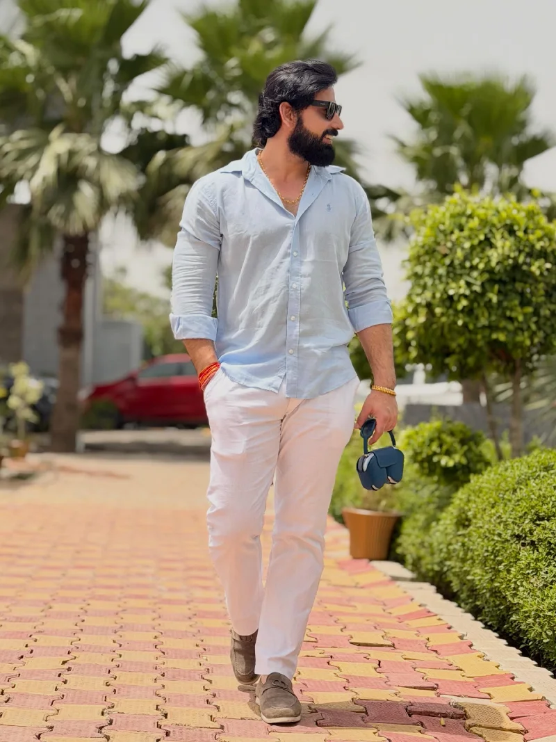 Light Blue Collared Shirt with White Trousers and Suede Loafers