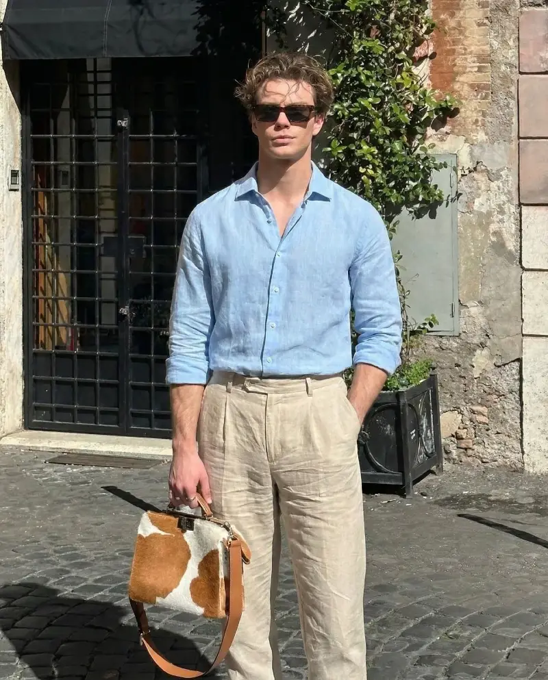 Light Blue Linen Shirt with Beige Trousers and Cowhide Bag