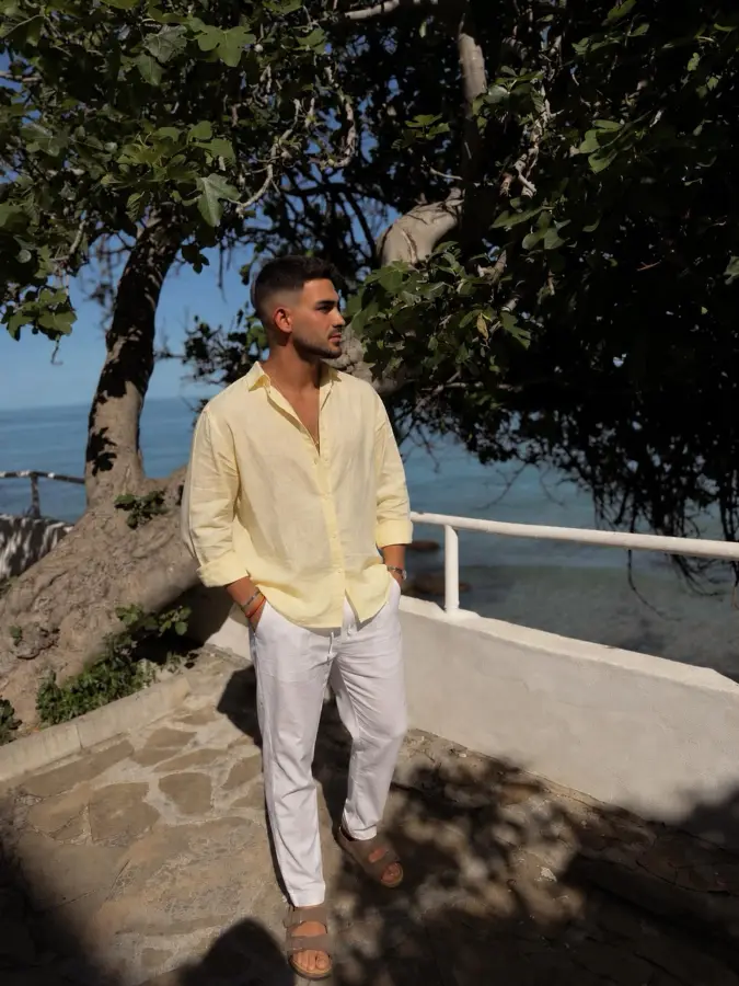 Linen separates in coastal tones — a thoughtful take on refined leisure.