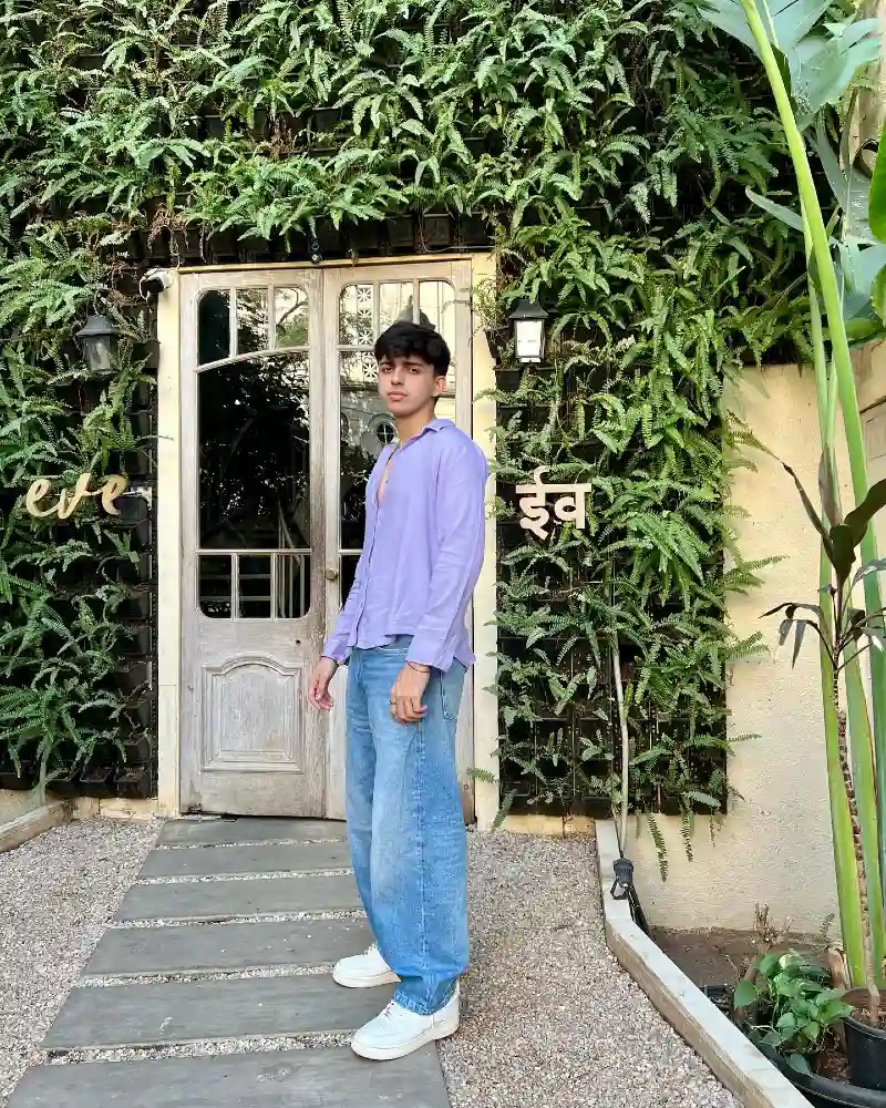 Medium Wash Baggy Jeans with Lavender Button-Down and White Sneakers