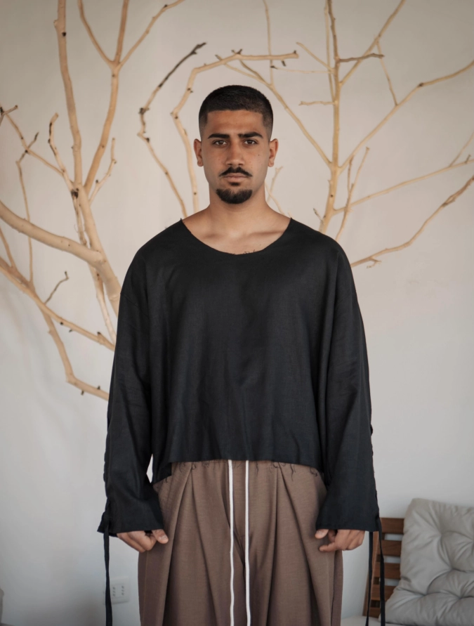 Minimalist Black and Taupe Relaxed Resort Wear - Anchoring Boho Summer Outfits for Men That Are Free-Spirited and Genuinely Cool