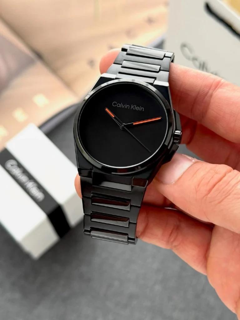 Monochrome Black Watch with Bright Orange Hands