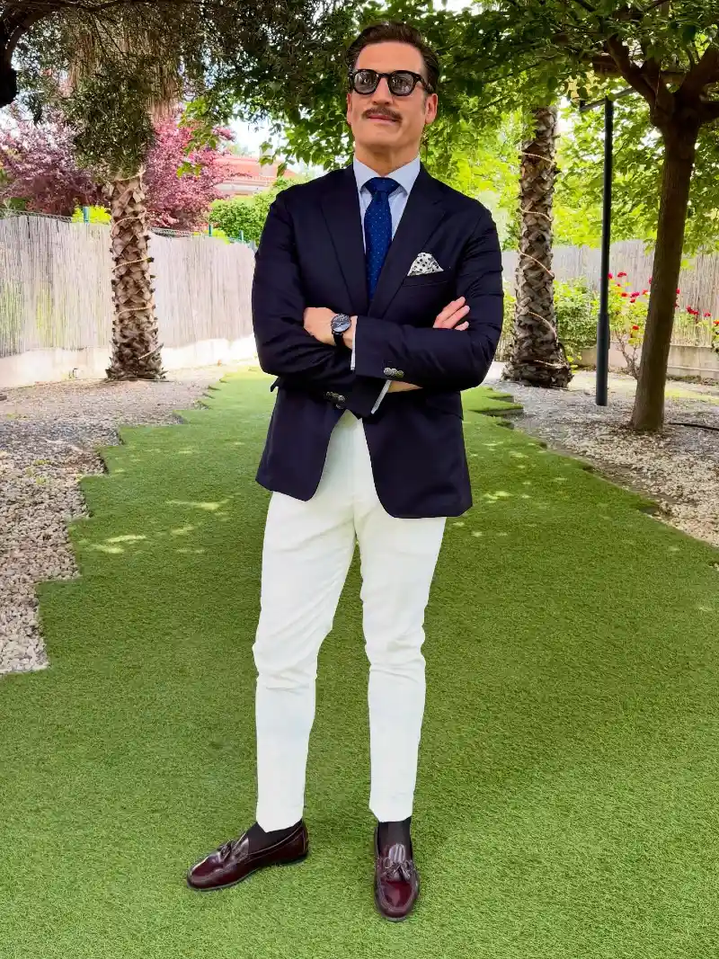 Navy Blazer with Bright White Trousers and Burgundy Tassel Loafers