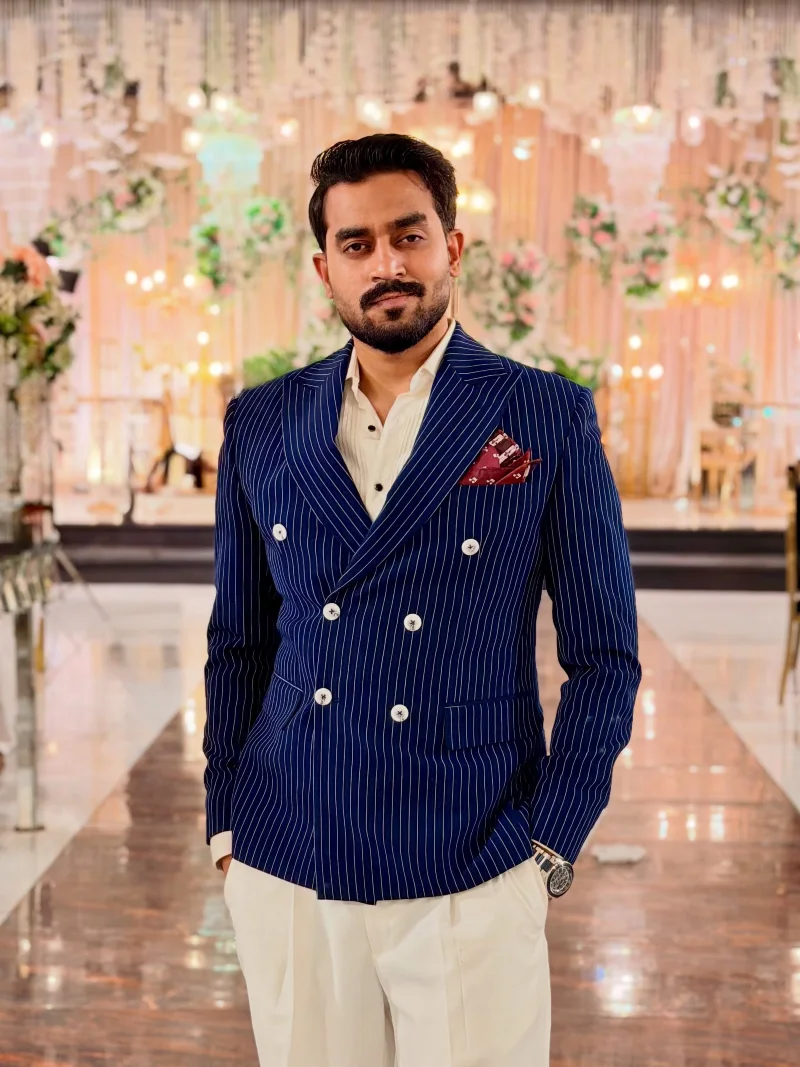 Navy Pinstripe Double-Breasted Blazer with Cream Pleated Trousers