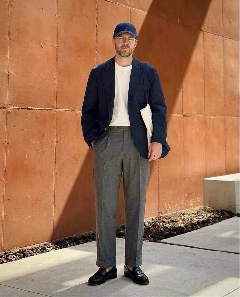Navy Unstructured Blazer with Grey Pleated Trousers and Black Loafers