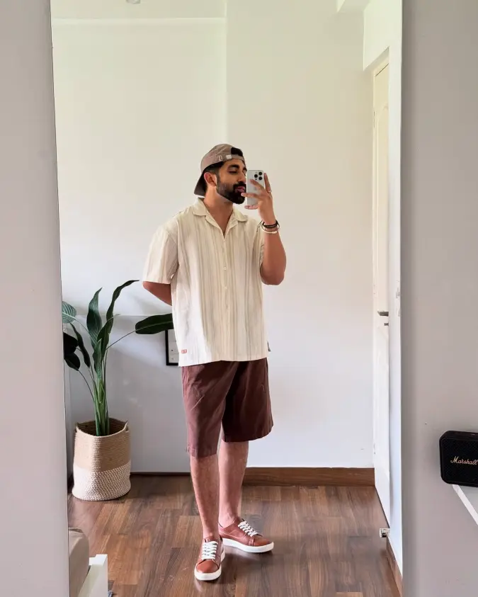 Neutral Striped Relaxed Shirt and Earthy Brown Shorts – Lightweight packing for a spontaneous escape.