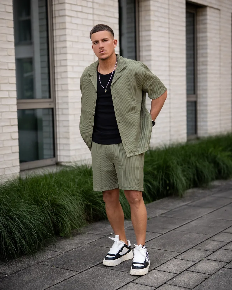 Olive Pleated Co-ord Set with Black Tank and Chunky Sneakers