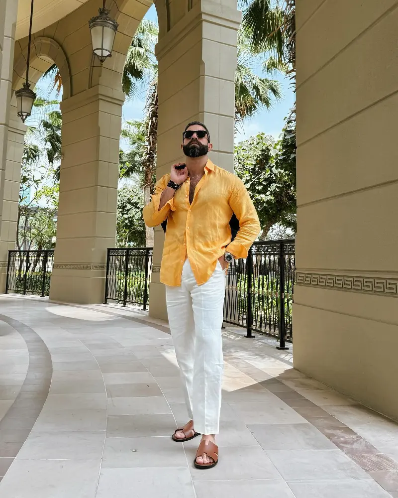 Orange Linen Shirt with White Trousers and Brown Leather Slides