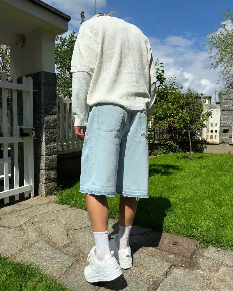 Oversized Cream Knit Sweater with Baggy Frayed Denim Shorts