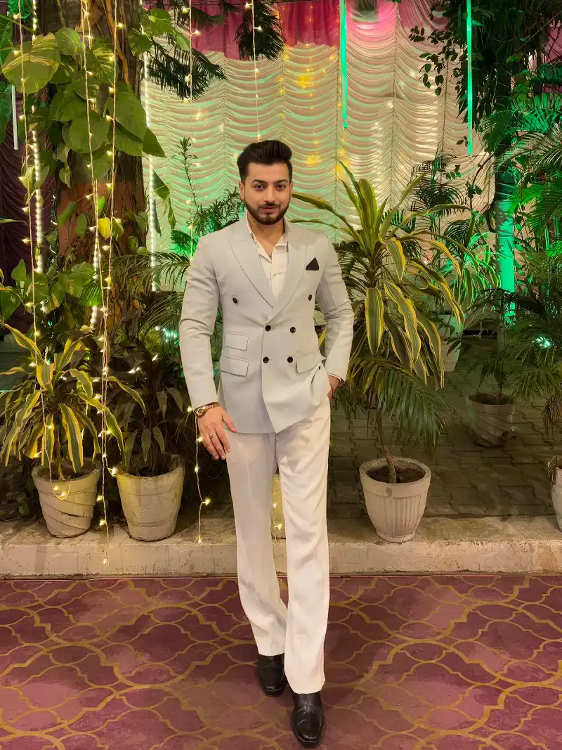 Pale Blue Double-Breasted Jacket with Crisp White Trousers