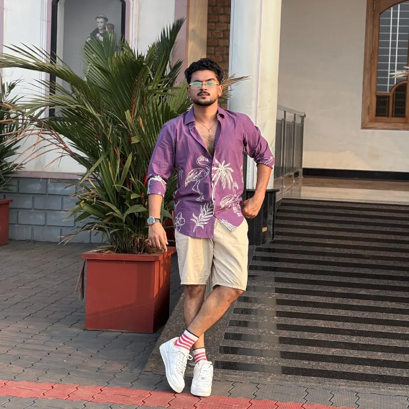 Purple Flamingo Long-Sleeve with Khaki Shorts and White Sneakers