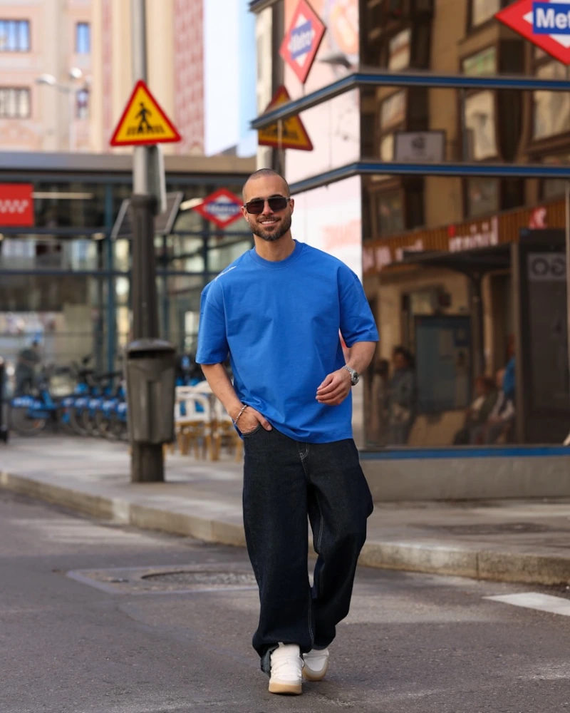 Raw Dark Baggy Jeans with Oversized Blue Tee and White Sneakers