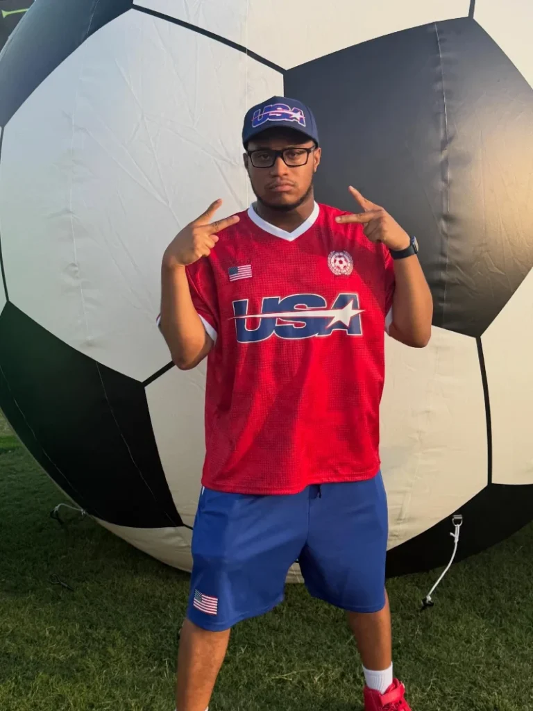 Red Graphic USA Jersey with Blue Flag-Patch Shorts and Red High-Tops