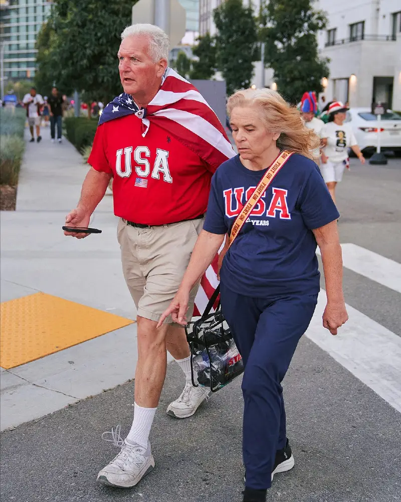 Red Graphic USA Tee with Khaki Shorts and Athletic Sneakers