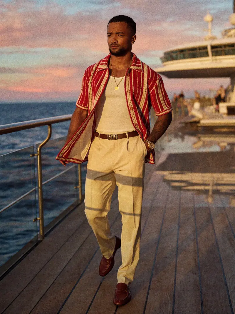 Red Striped Knit Shirt over White Tank with Cream Pleated Trousers