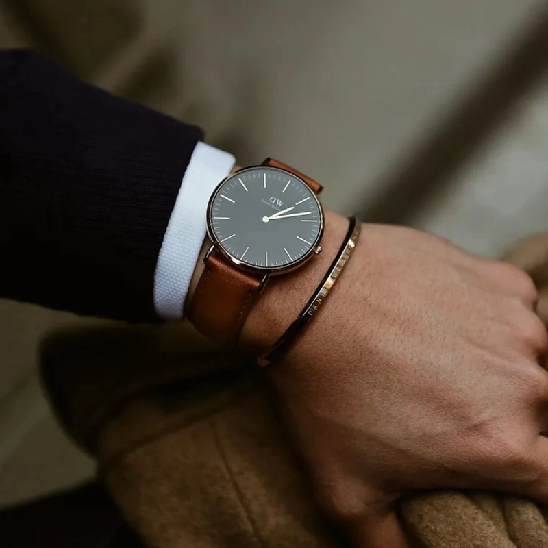 Rose Gold Watch with Black Dial and Tan Leather Strap
