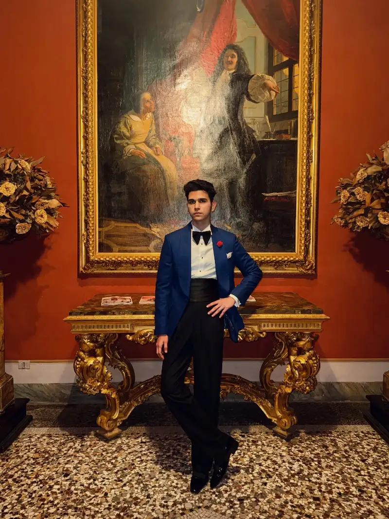 Royal Blue Dinner Jacket with Black Cummerbund and Red Lapel Pin