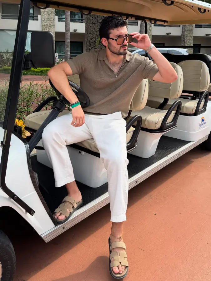 Sage Knitted Polo and Relaxed Trousers: A Blueprint for Vacation Ease