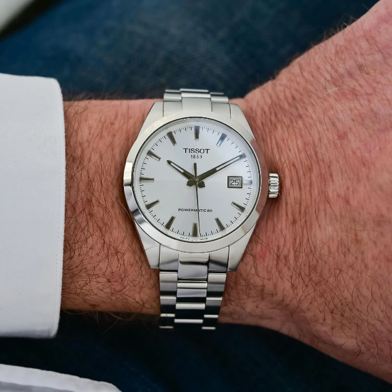 Stainless Steel Watch with Silver Dial and White Dress Shirt