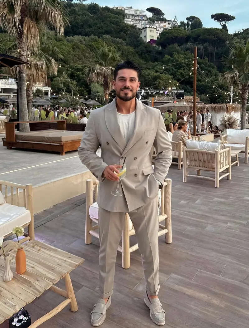 Stone Double-Breasted Suit with White T-Shirt and Suede Loafers