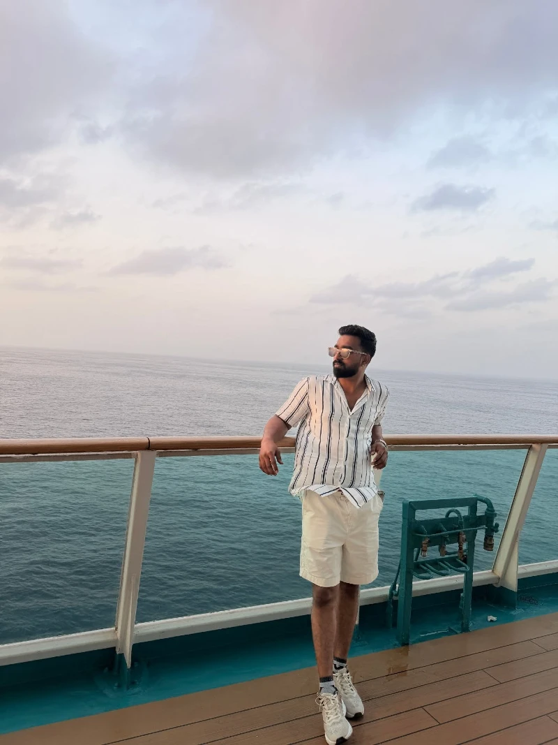 Striped Short-Sleeve Shirt with Cream Shorts and Chunky Sneakers
