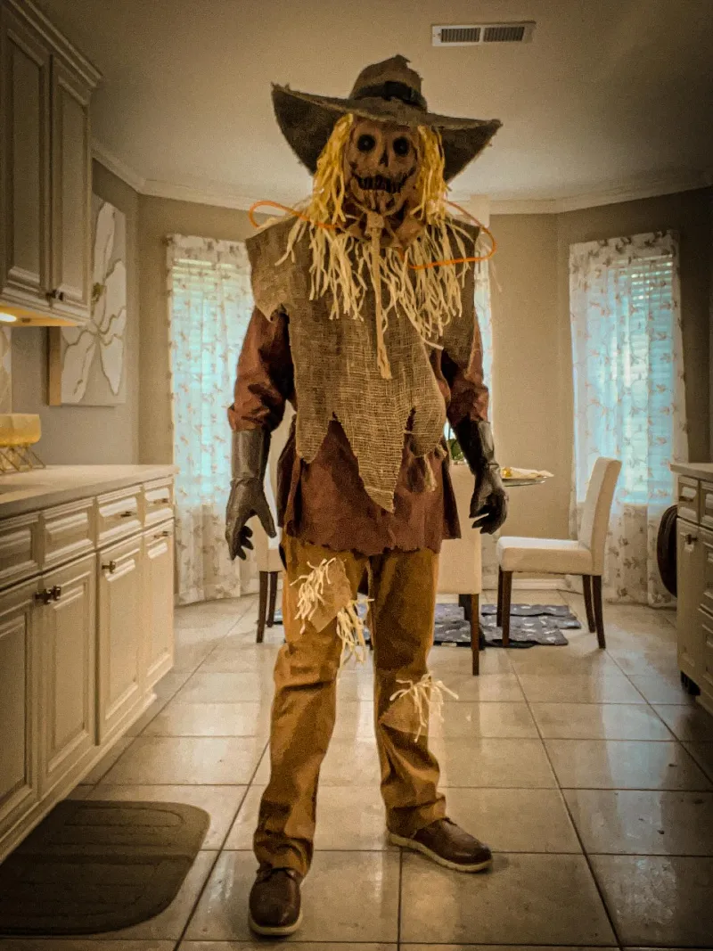 Terrifying Scarecrow with Burlap Poncho and Straw Accents