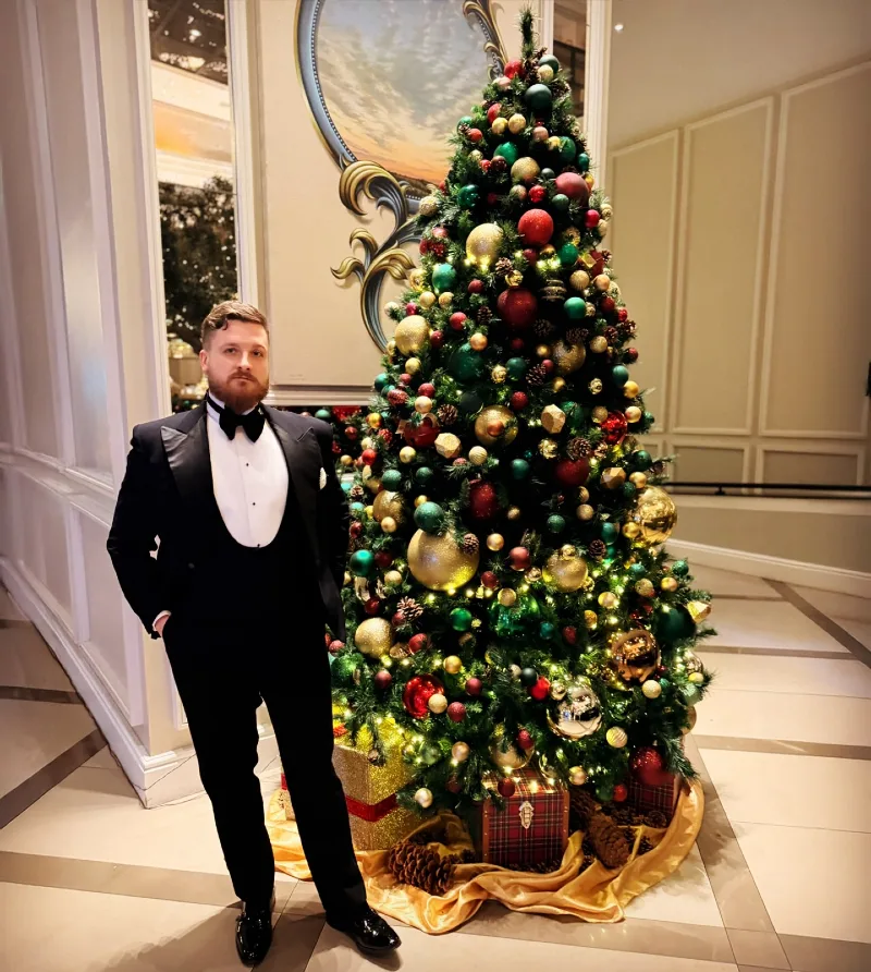Three-Piece Black Tuxedo with Horseshoe Waistcoat and Glossy Dress Shoes
