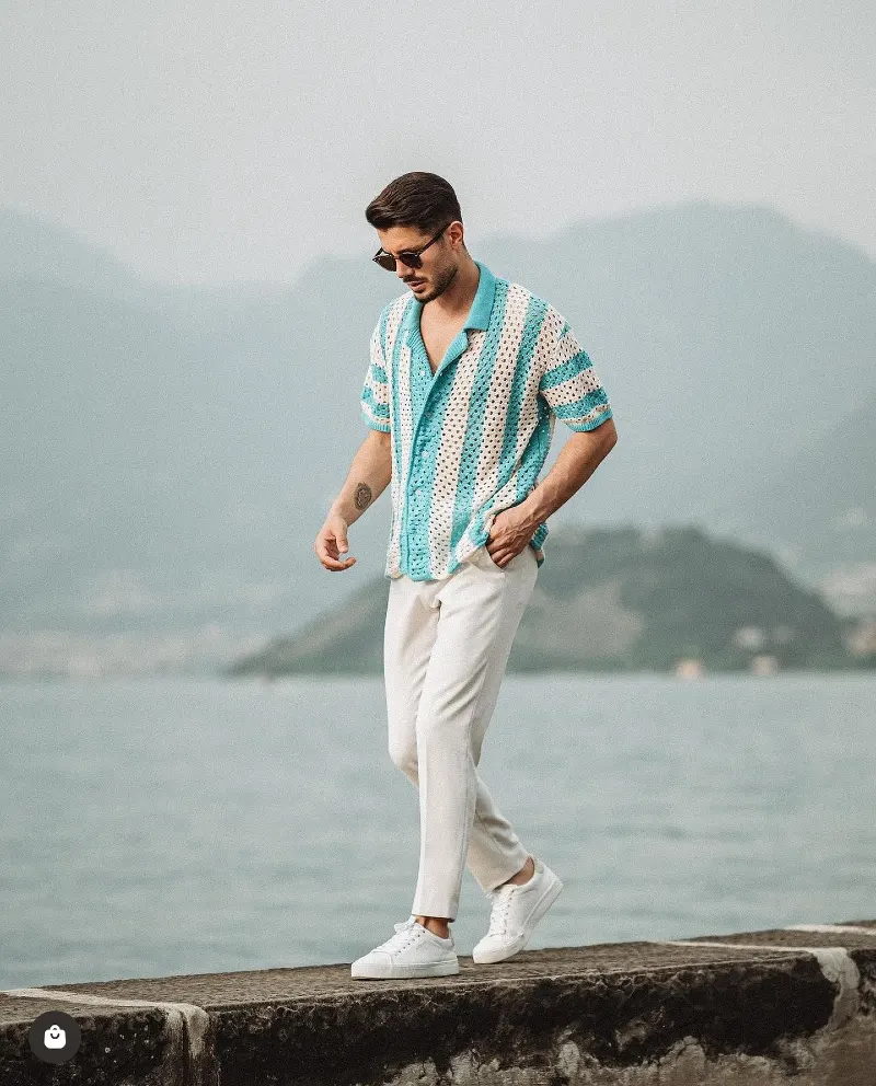 Turquoise and White Crochet Polo with Slim Cream Trousers
