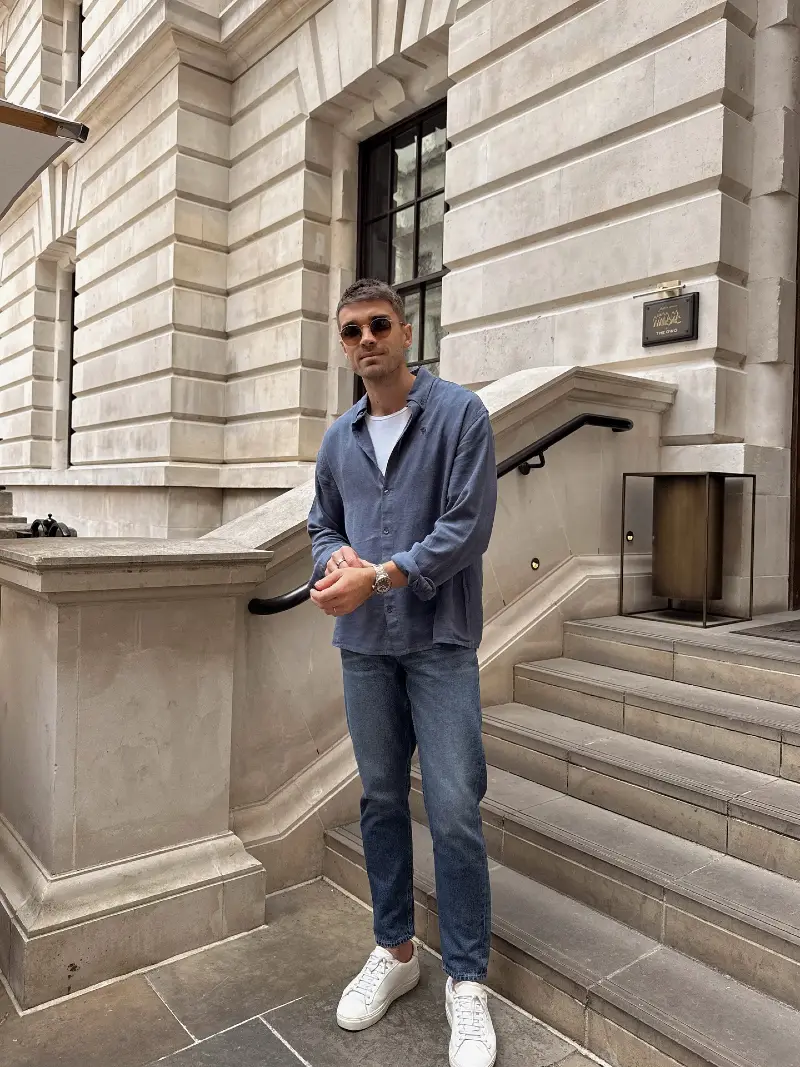 Washed Blue Button-Down with Cropped Jeans and White Sneakers